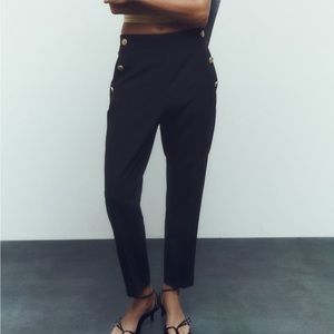 High waste dress pants with elastic band on the back.